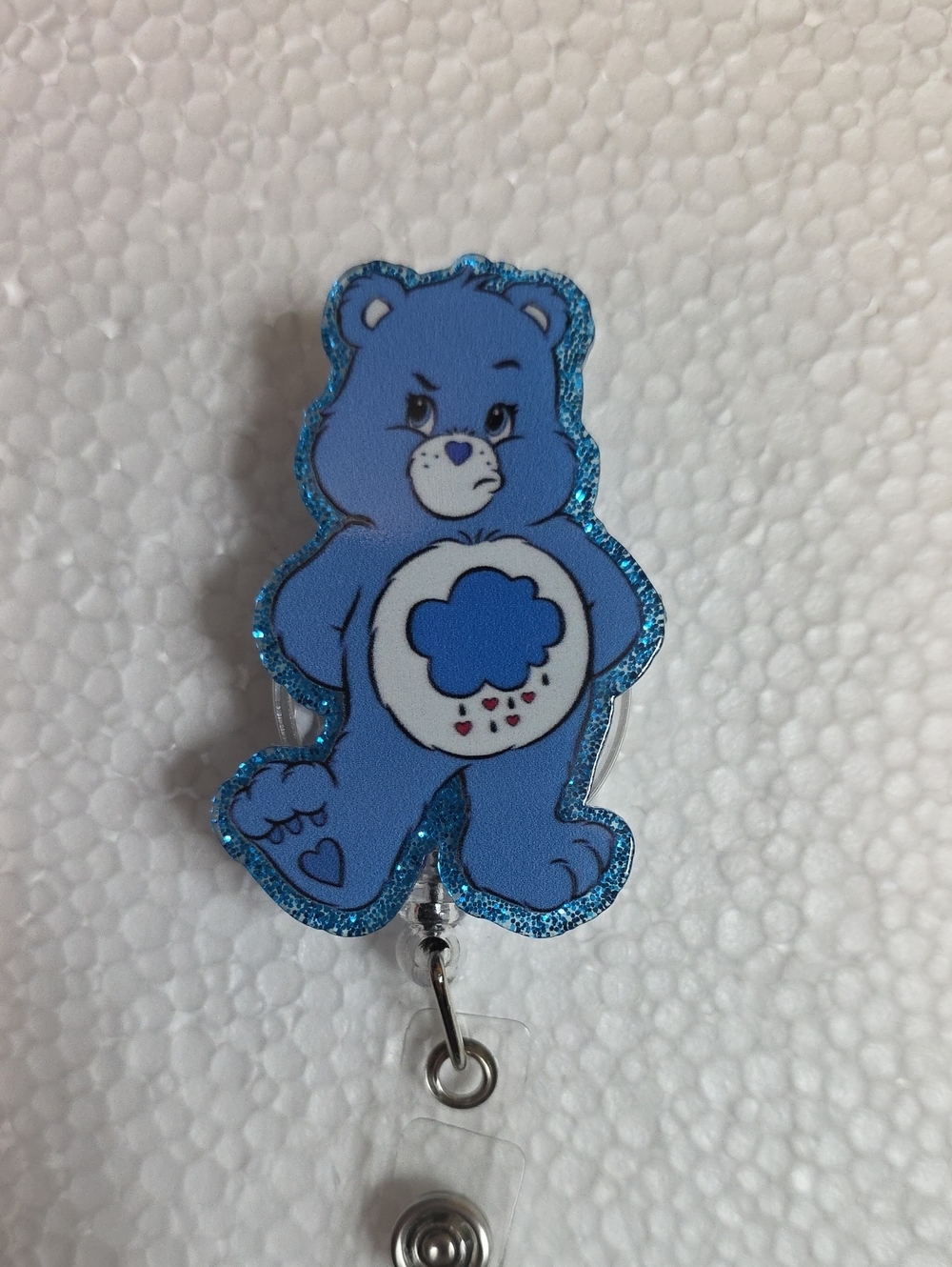 Grumpy Bear Badge Reel